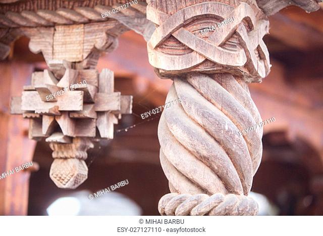 Detail of a wooden carved door column in Maramures, Romania