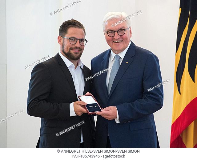 German President Frank-Walter STEINMEIER honors hockey player Yannic SEIDENBERG (Munich). Awarded the Silver Laurel Leaf and the Order of Merit by the Federal...
