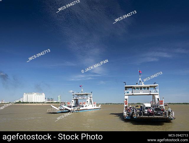 passenger ferry boat crossing the Mekong river in Phnom Penh Cambodia