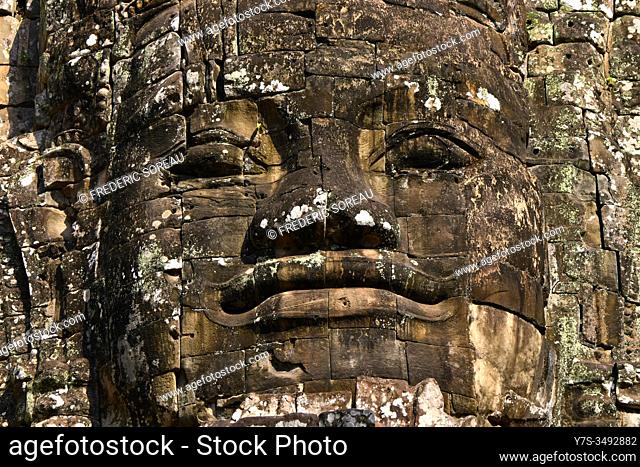 Head sculpture, South gate, Angkor Thom archaelogical park, Unesco World Heritage Site, Siem Reap, Cambodia, South East Asia