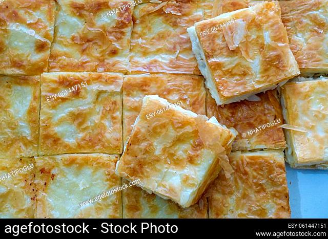turkish style cheese pie, water pastry tray, serving börek, turkish style börek close-up