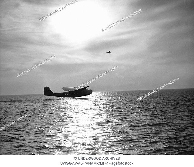 Alameda, California: November 22, 1935.The China Clipper seaplane as it lifts off of San Franciaco Bay on the inaugural flight of Pan American Airways'...