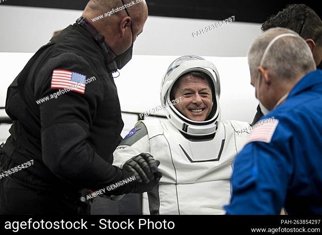 NASA astronaut Shane Kimbrough is helped out of the SpaceX Crew Dragon Endeavour spacecraft onboard the SpaceX GO Navigator recovery ship after he and NASA...