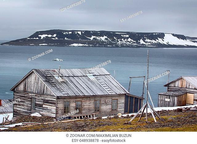 Severe land. One of the oldest polar stations in Arctic (founded in 1928, now abandoned). Wooden houses have been preserved well