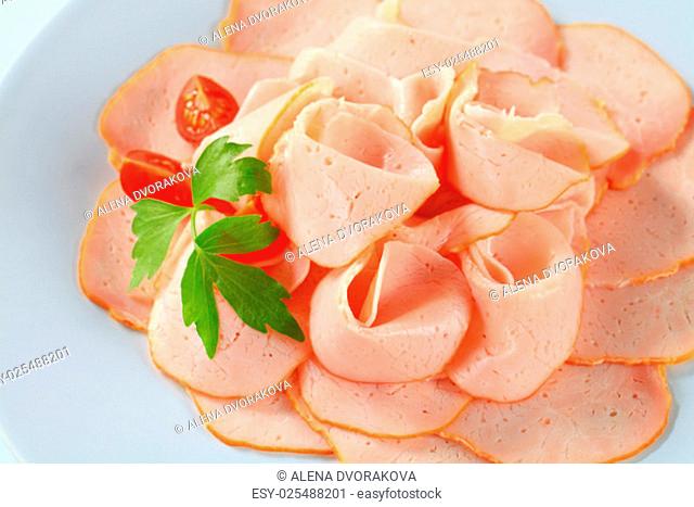 Thinly shaved cured chicken breast