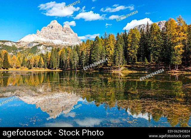 Scenic view at a mountain with reflections in a lake at autumn