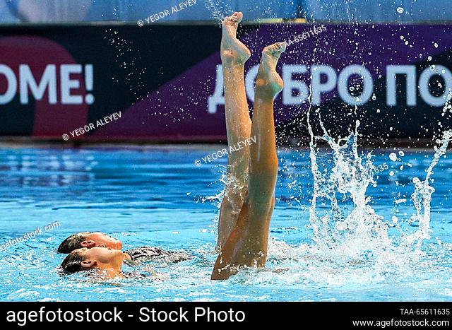 RUSSIA, KAZAN - DECEMBER 10, 2023: Swimmers Ziedakhon Toshkhuzhaeva and Diana Onkes of Uzbekistan perform their duet free routine during the Synchronised...