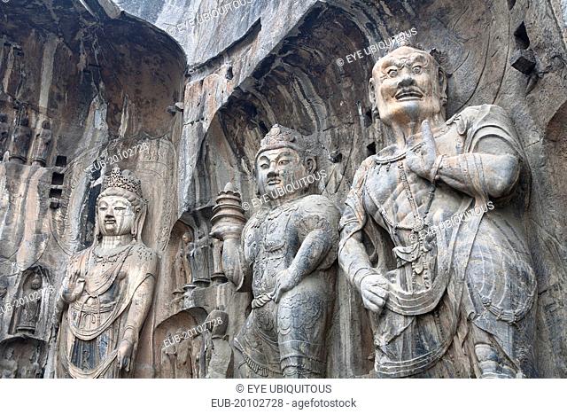 Carved Buddhist statues Fengxian Temple Tang Dynasty Longmen Grottoes and Caves