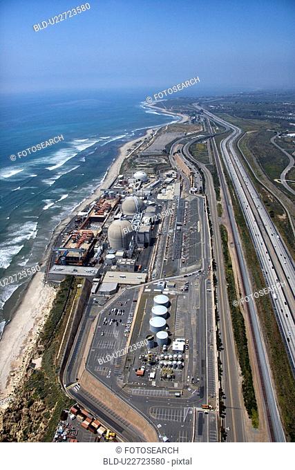 Aerial of nuclear power plant on California coast, USA