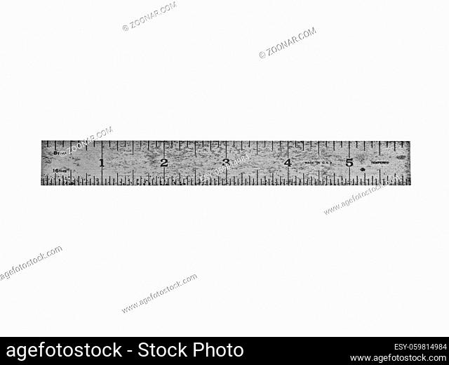 vintage straight steel ruler over white, clipping path