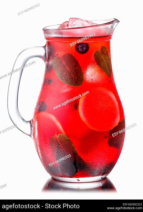 Glass jug or pitcher of iced blueberry lemonade, isolated