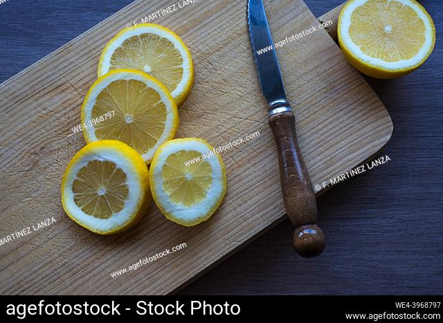 Natural lemon sliced on a board