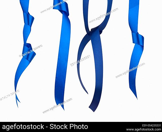 blue and dark blue silk ribbon hanging with a knotted and isolated on a white background, element for the designer