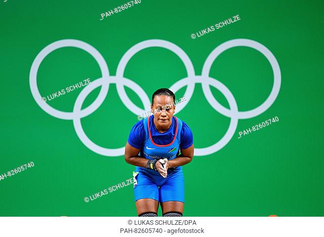 Jenly Wini of the Solomon Islands competes during the Women's 58kg Group B category of the Rio 2016 Olympic Games Weightlifting events at the Riocentro in Rio...