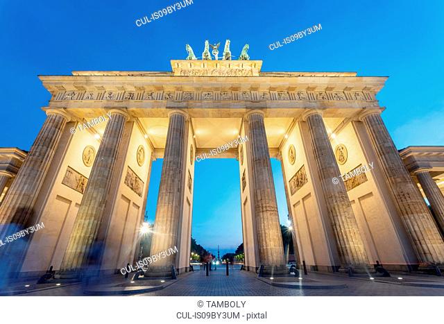 Brandenburg Gate against blue sky at sunset, low angle view, Berlin, Germany