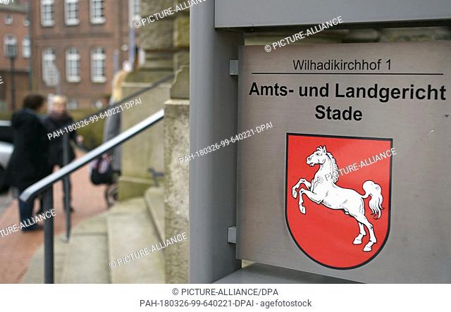 26 March 2018, Germany, Stade: The sign 'Amts-und Landgericht Stade' (lit. district court Stade' at the entrance to the court