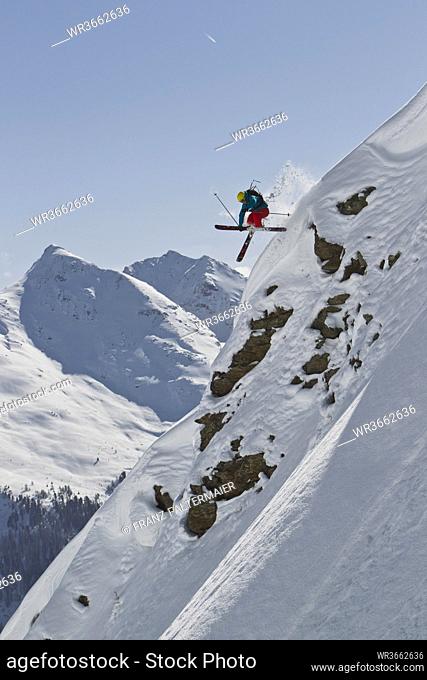 Austria, Man skiing on snowcapped mountains