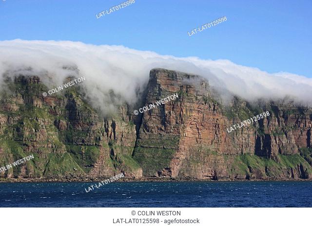 Hoy is the second largest island in Orkney. St John's Head is the highest vertical sea cliff in Britain. It is often enveloped by the sea haar or sea-haar mist...