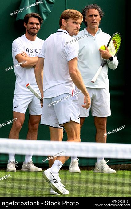 Goffin's coach Germain Gigounon, Belgian David Goffin and Goffin's coach Yannis Demeroutis a training session ahead of the 2023 Wimbledon grand slam tennis...