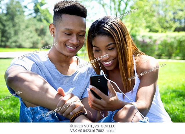 Couple using smartphone