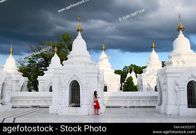 MYANMAR, MANDALAY - OCTOBER 25, 2023: A tourist at the Kuthodaw Pagoda. Yuri Smityuk/TASS