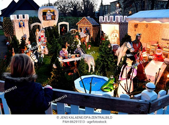 The garden of a house belonging to the Schultz family decorated with numerous Christmas lights and figurines in Dessau, Germany, 24 November 2016