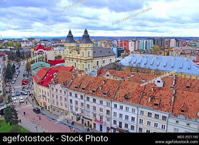 View to Ivano-Frankivsk from a bird's eye view with blue sky on background. View from above. Bad weather in city