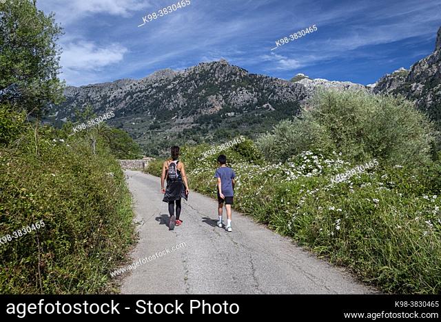 two hikers on the way, Binibassí, Soller valley route, Mallorca, Balearic Islands, Spain