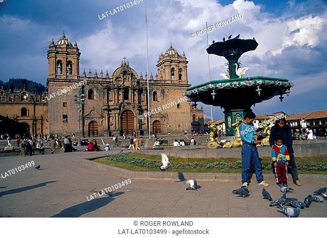 City in high valley in Andes. Plaza de Armas. Large church. Fountain. People