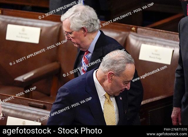 Senate Majority Leader Chuck Schumer of N.Y., front, and Senate Minority Leader Mitch McConnell of Ky., arrive before President Joe Biden delivers his first...