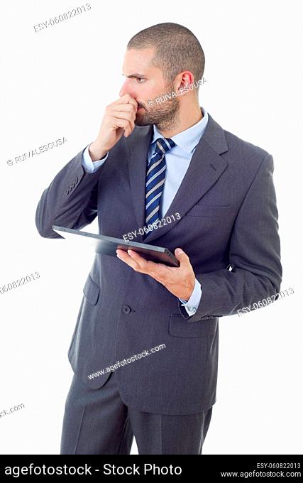 pensive businessman working with a tablet pc, isolated