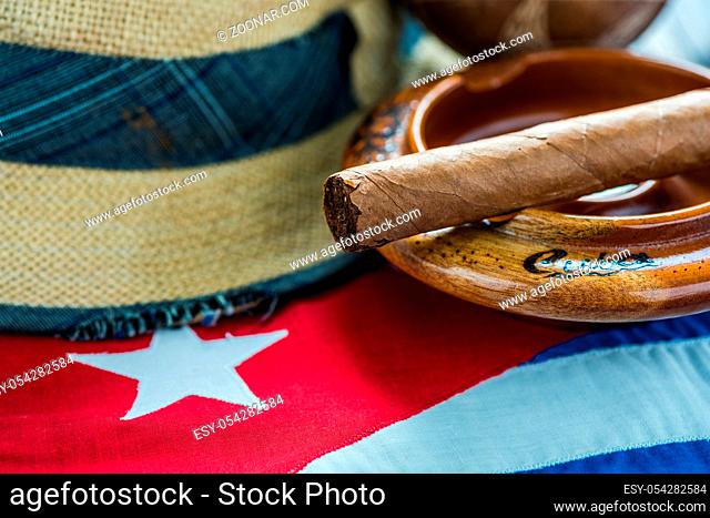 Cuban flag, panama hat and musical instrumet.Vacation in Cuba concept