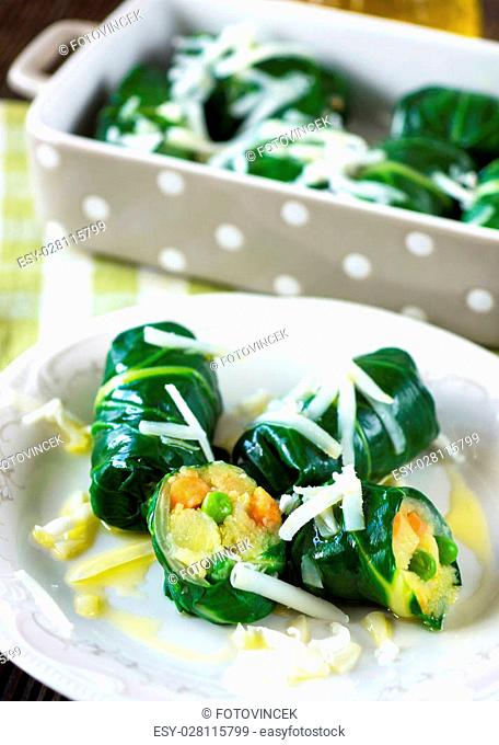 Gourmet chard roll with potatoes, peas, carrots and goat cheese
