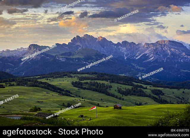 View over the Alpe di Siusi (foreground) to the peaks of the Geisler Group and the Cisles Valley, South Tyrol, Italy, Europe