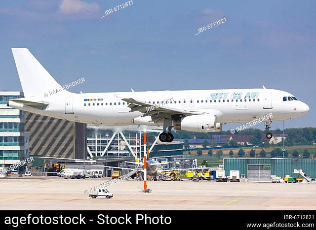 An Airbus A320 of Just Us Air with the registration YR-DSI lands at Stuttgart Airport, Germany, Europe