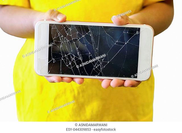 Kids holding a crack smartphone isolated on white background