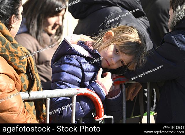 People queue outside a center for the registration and shelter of Ukrainian refugees, at the former Jules Bordet hospital in Brussels Tuesday 08 March 2022
