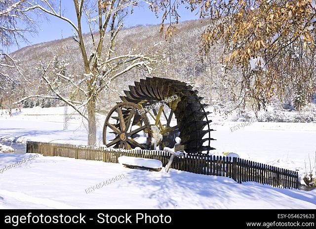 Old water wheel of an historic water mill, Schmiechtal valley near Ulm, Germany