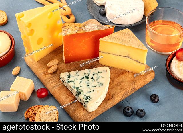 Cheese platter. Blue cheese, red Leicester, Brie, Emmental and others with wine
