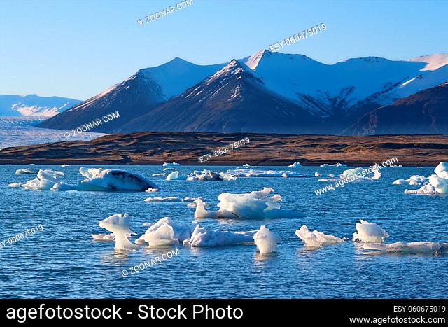 Glacial lake in Jokulsarlon with floating icebergs