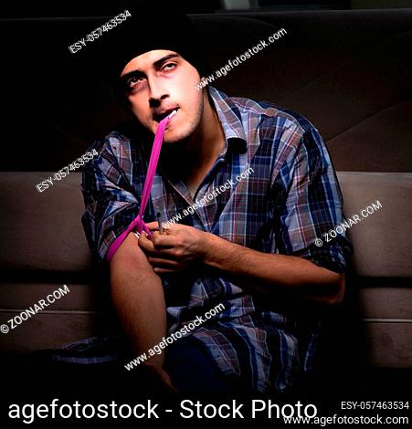 The young man in agony having problems with narcotics