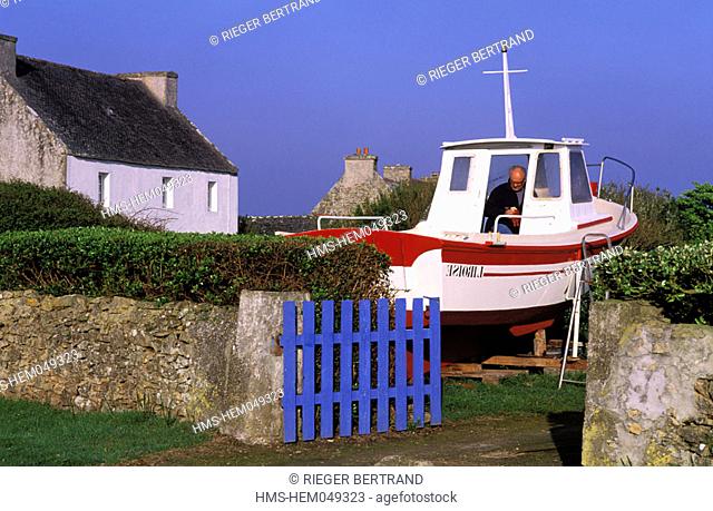 France, Finistère (29), Ouessant island, boat put away for the winter in a garden