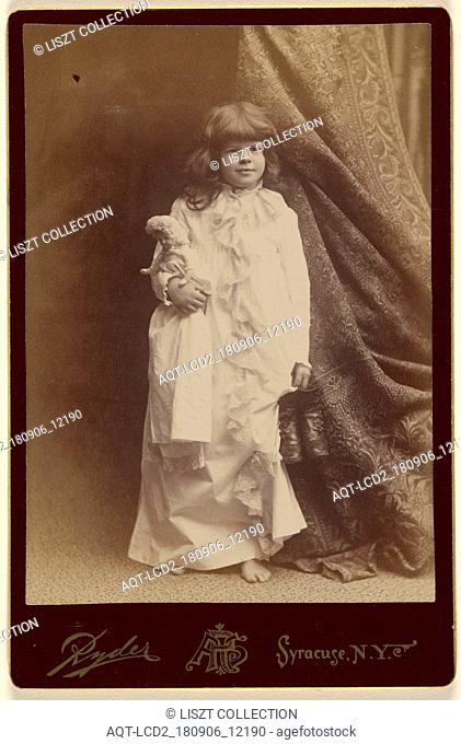 Ethel Butter in white dressing gown, holding pair of shoes and a doll, standing; Philip S. Ryder (American, active 1870s - 1920s); 1886; Albumen silver print