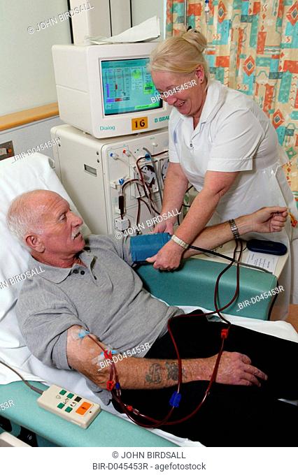 Support Nurse on Dialysis Unit checking renal outpatients blood pressure