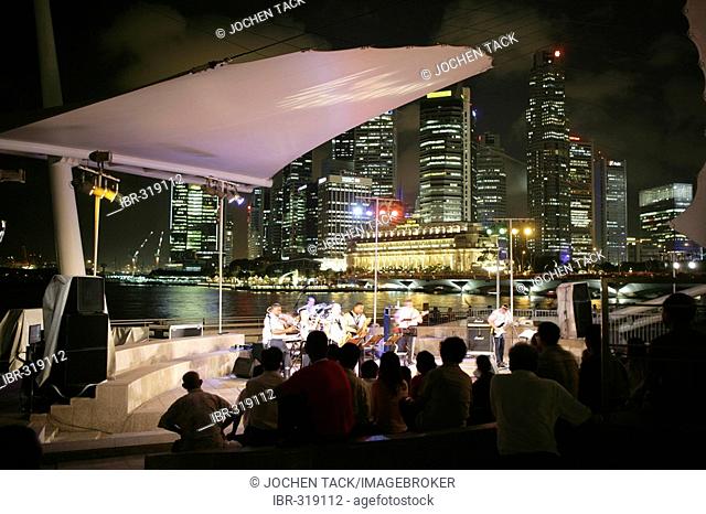 SGP, Singapore: City Skyline. Open air concert. Marina Park. |