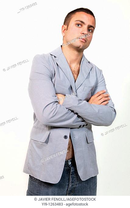 Young man wearing suit jacket and no shirt