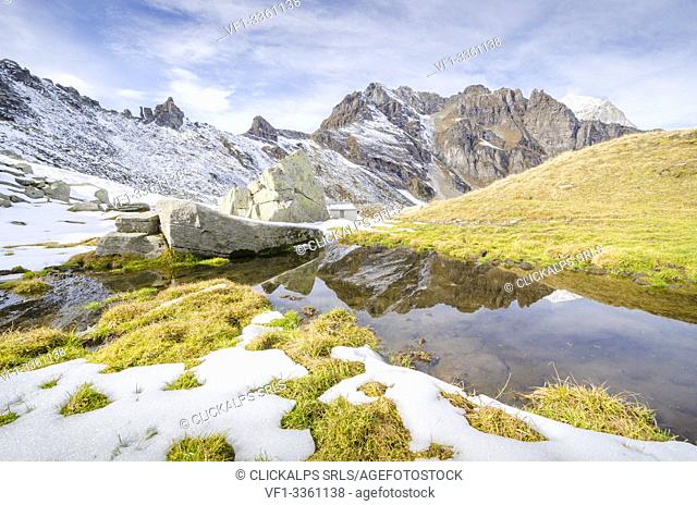 Snow and a puddle, Possette pass, Val Divedro, Ossola, Piedmont, Italian alps, Italy