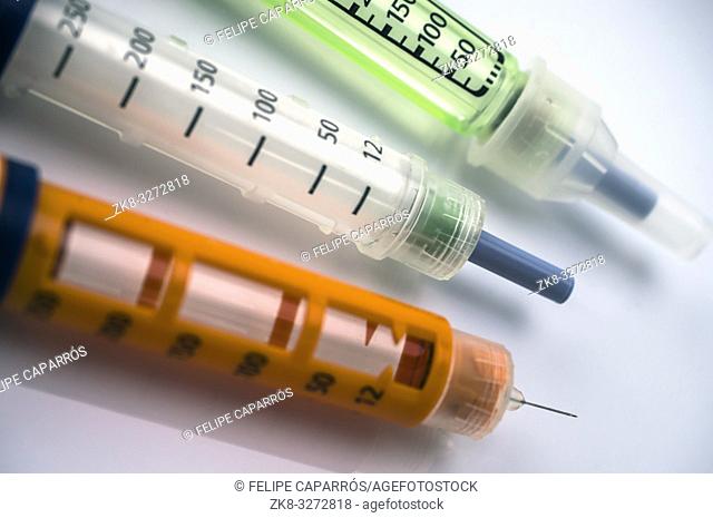Several Injectors of insulin, conceptual image, composition horizontal