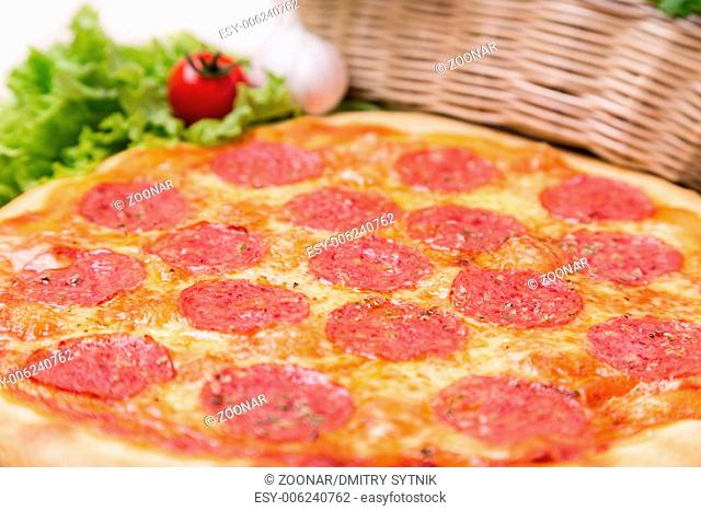 hot pizza with garnish and components