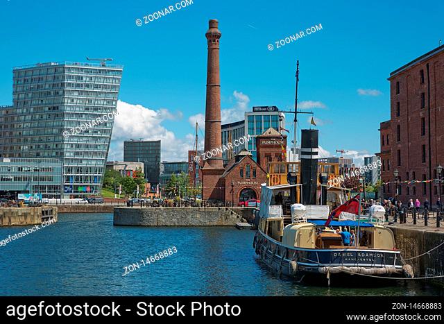 LIVERPOOL, ENGLAND, UK - JUNE 07, 2017: View of Albert Dock in Liverpool, England. The Albert Dock is a complex of dock buildings and warehouses